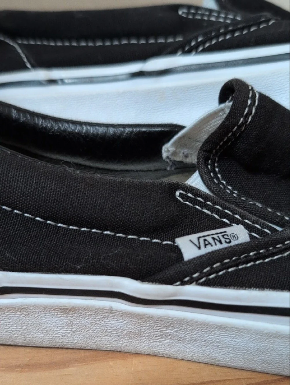 Vans Kids Slip-On Canvas Sneakers - Black & White 3.5 M/5 W (Big Kid)